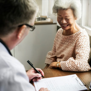 Recognising and diagnosing Dementia gp with elderly lady